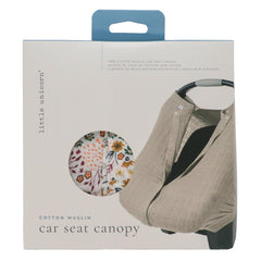Little Unicorn elastic-fit canopy stays secure around most car seats.