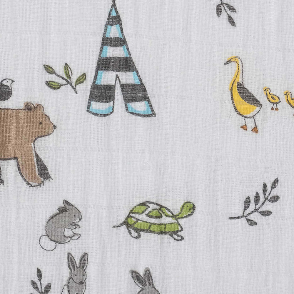 Little Unicorn Forest Friends crib sheet on standard crib mattress for cozy sleep
