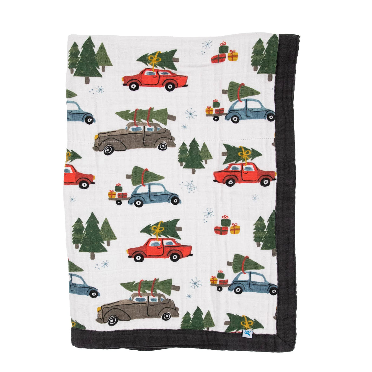 Little Unicorn four-layer muslin cuddle quilt offers soft warmth for newborn cuddles.