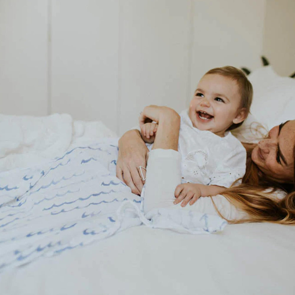 Little Unicorn gift-ready swaddle makes a thoughtful baby shower present.