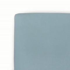 Little Unicorn Harbor stretch knit crib sheet close-up shows soft, premium texture.