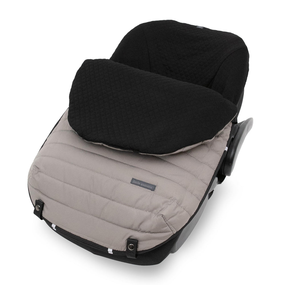 Little Unicorn infant car seat footmuff with open back design easing harness access.
