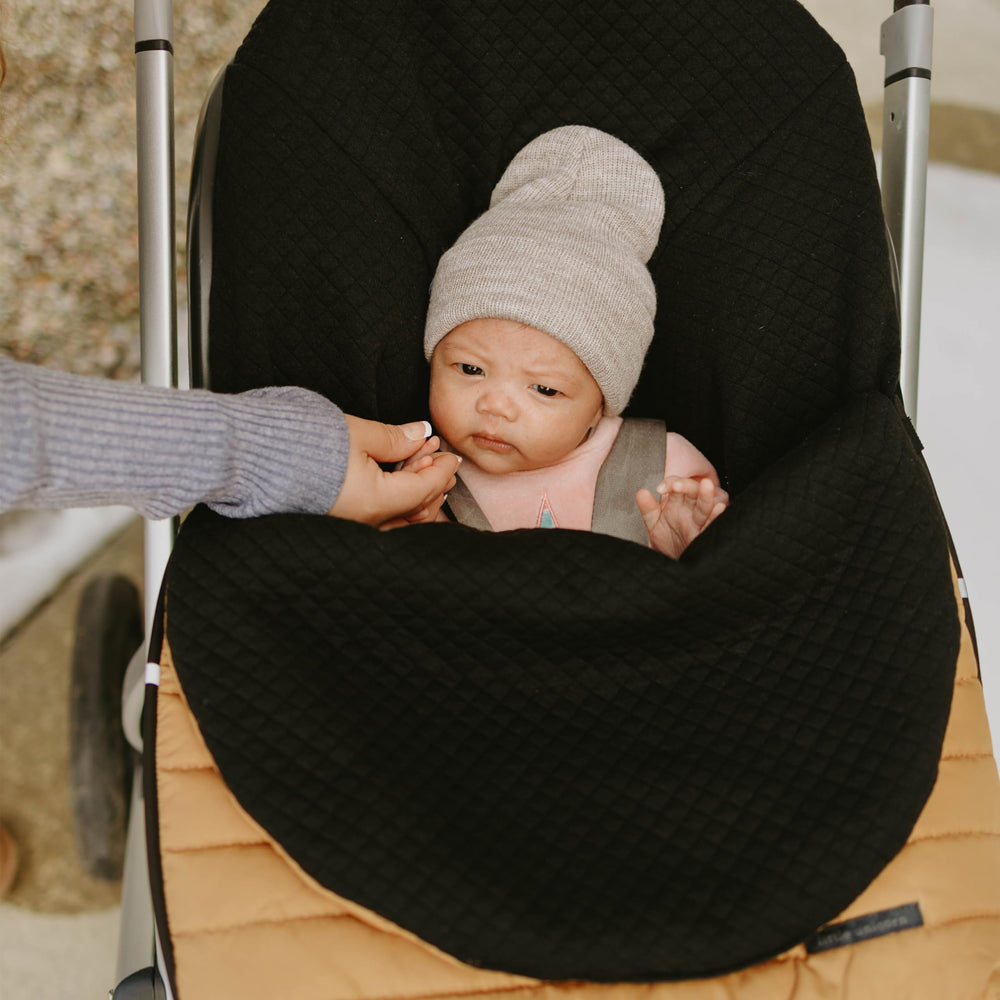 Little Unicorn footmuff silent magnetic closures enable quick checks
