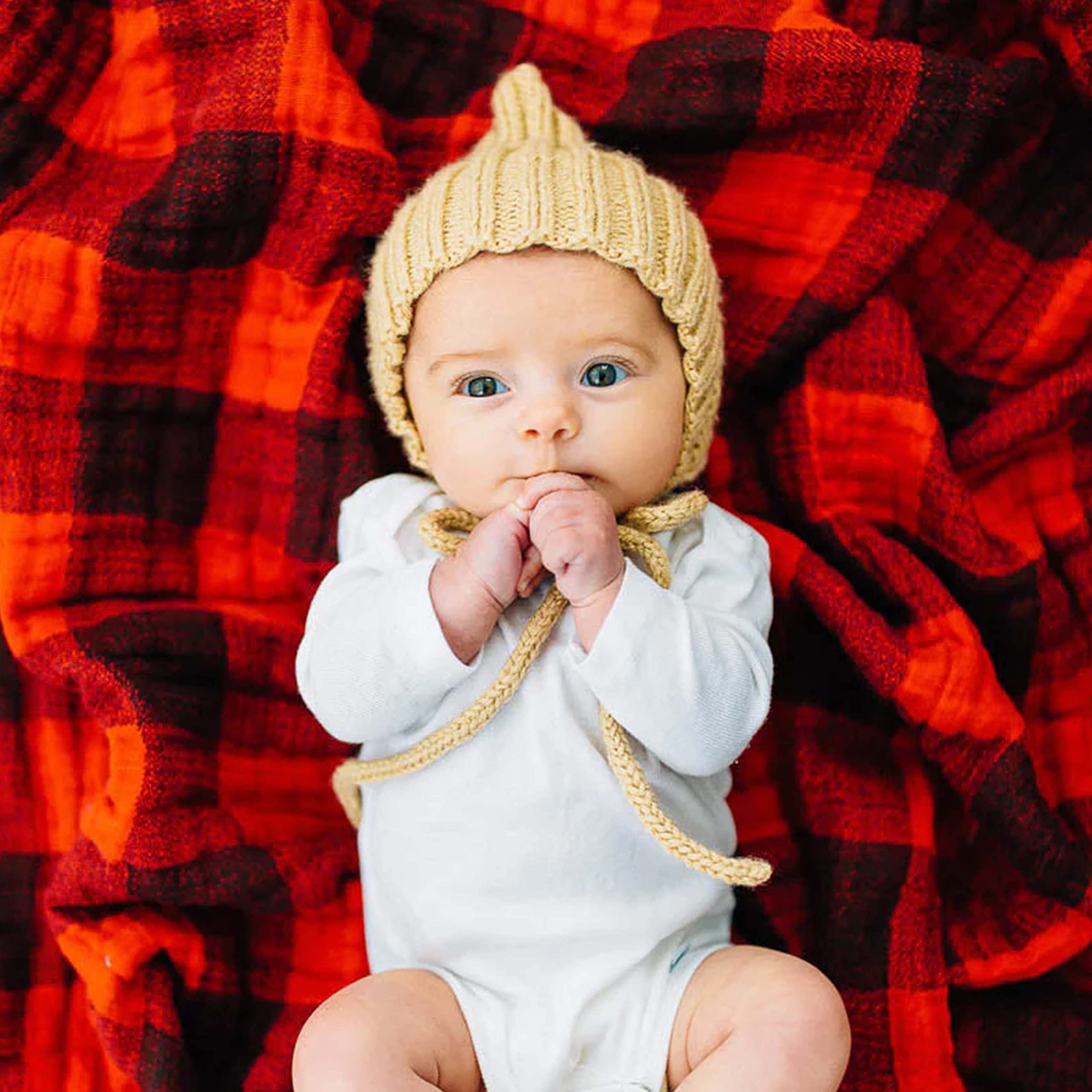 Little Unicorn lightweight swaddle-blanket offers breathable coverage for warm days.