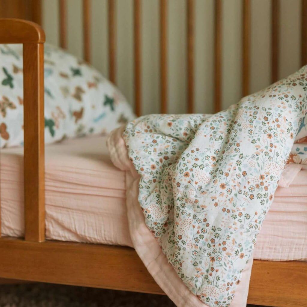 Little Unicorn Lofty Comforter presents a gift-ready design in enchanting prints.
