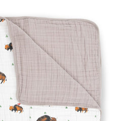 Square 47x47 inch Little Unicorn muslin quilt ideal for crib or daycare naps.