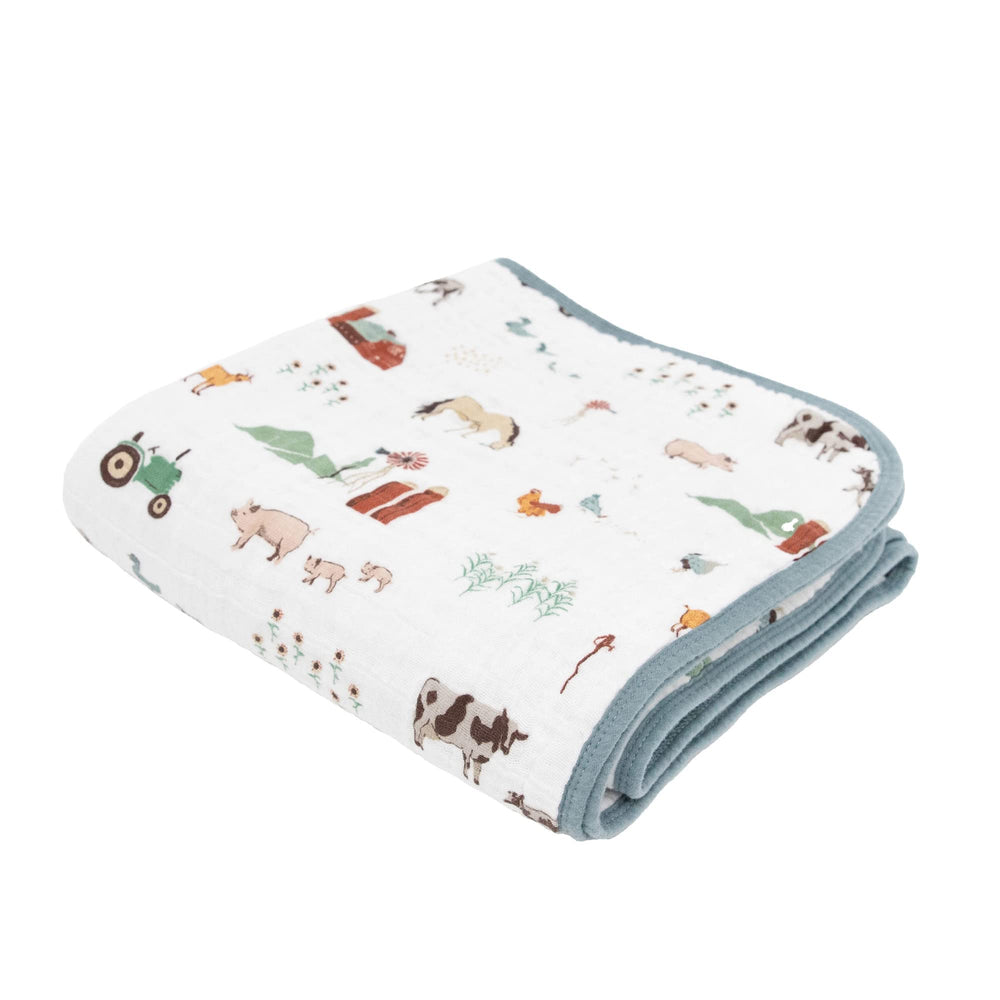 Little Unicorn muslin quilt blanket with soft multilayer fabric for cozy cuddles.