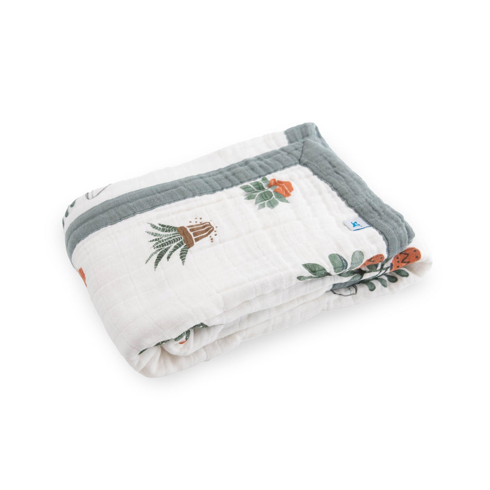 Little Unicorn muslin quilt highlights breathable fabric for warmth without overheating.