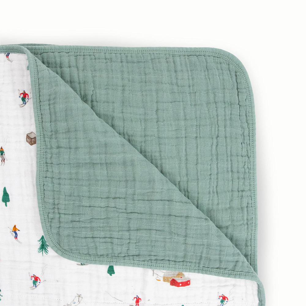 Little Unicorn muslin quilt Powder Party folded blanket ready for on-the-go snuggles