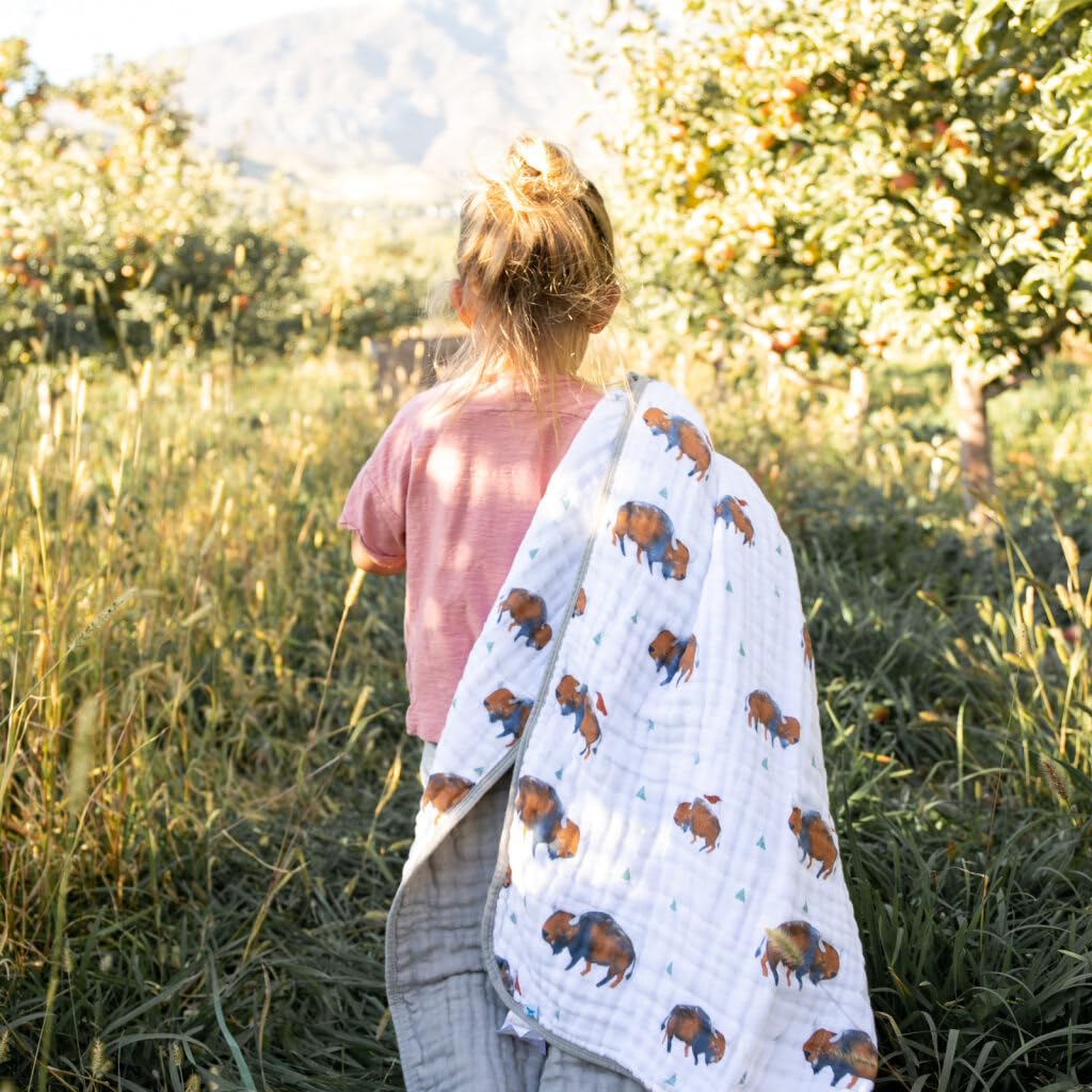 On-the-go snuggles with Little Unicorn quilt, compact for stroller or car seat.
