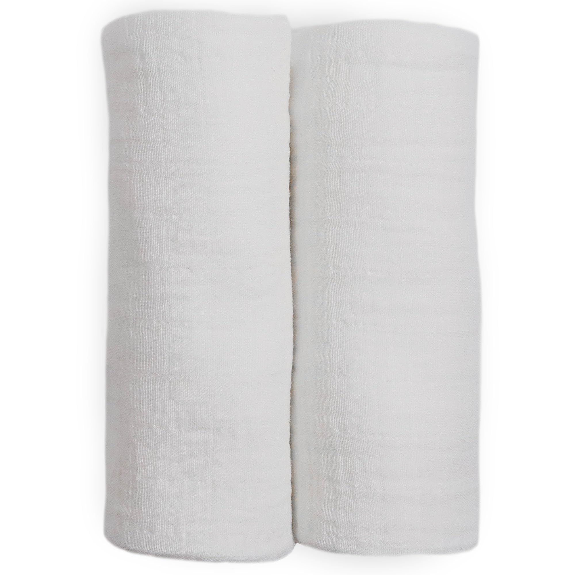 Little Unicorn muslin swaddle blanket white baby-nest setting conveys cozy snuggle potential.