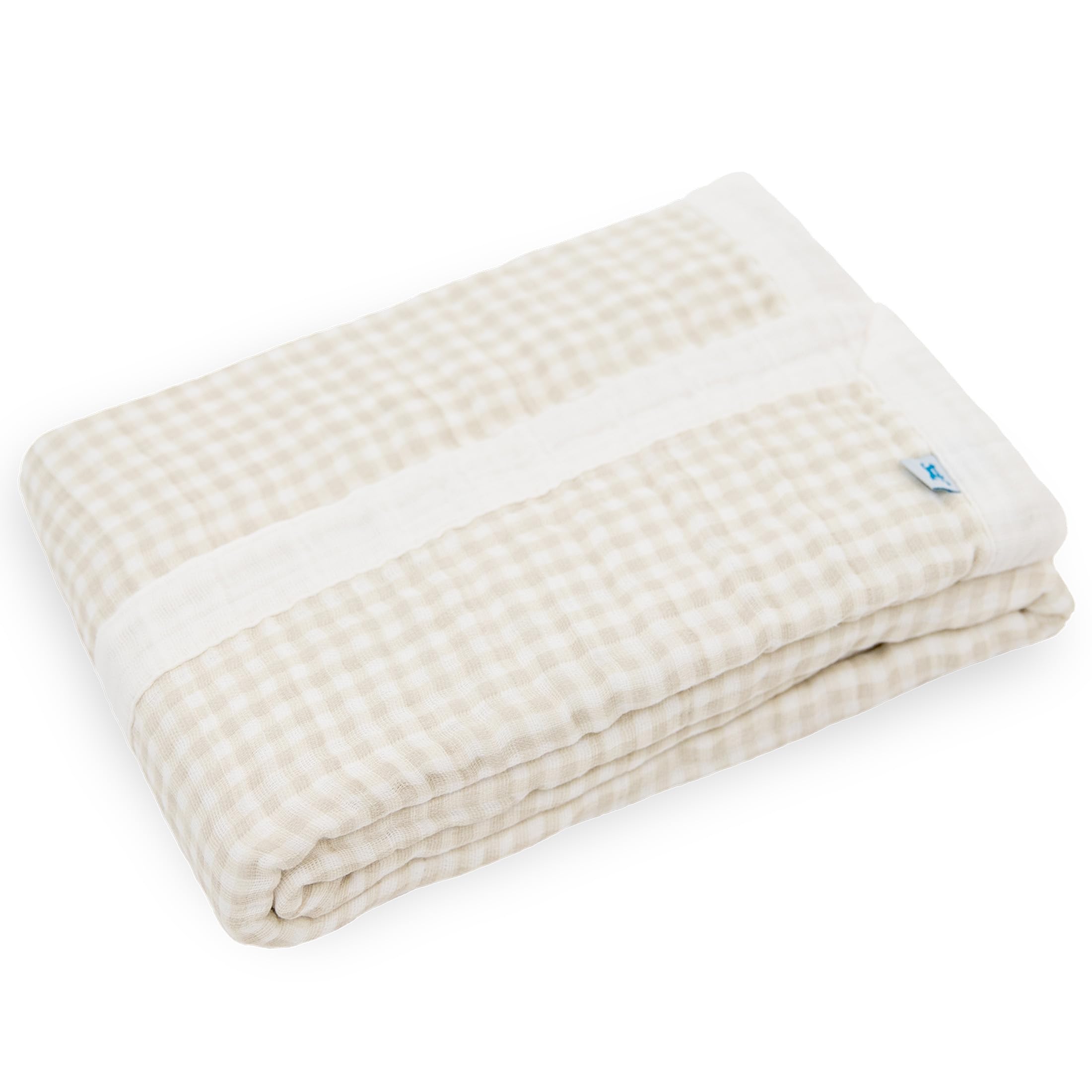 Little Unicorn newborn quilt used as stroller cover providing lightweight, breathable protection.