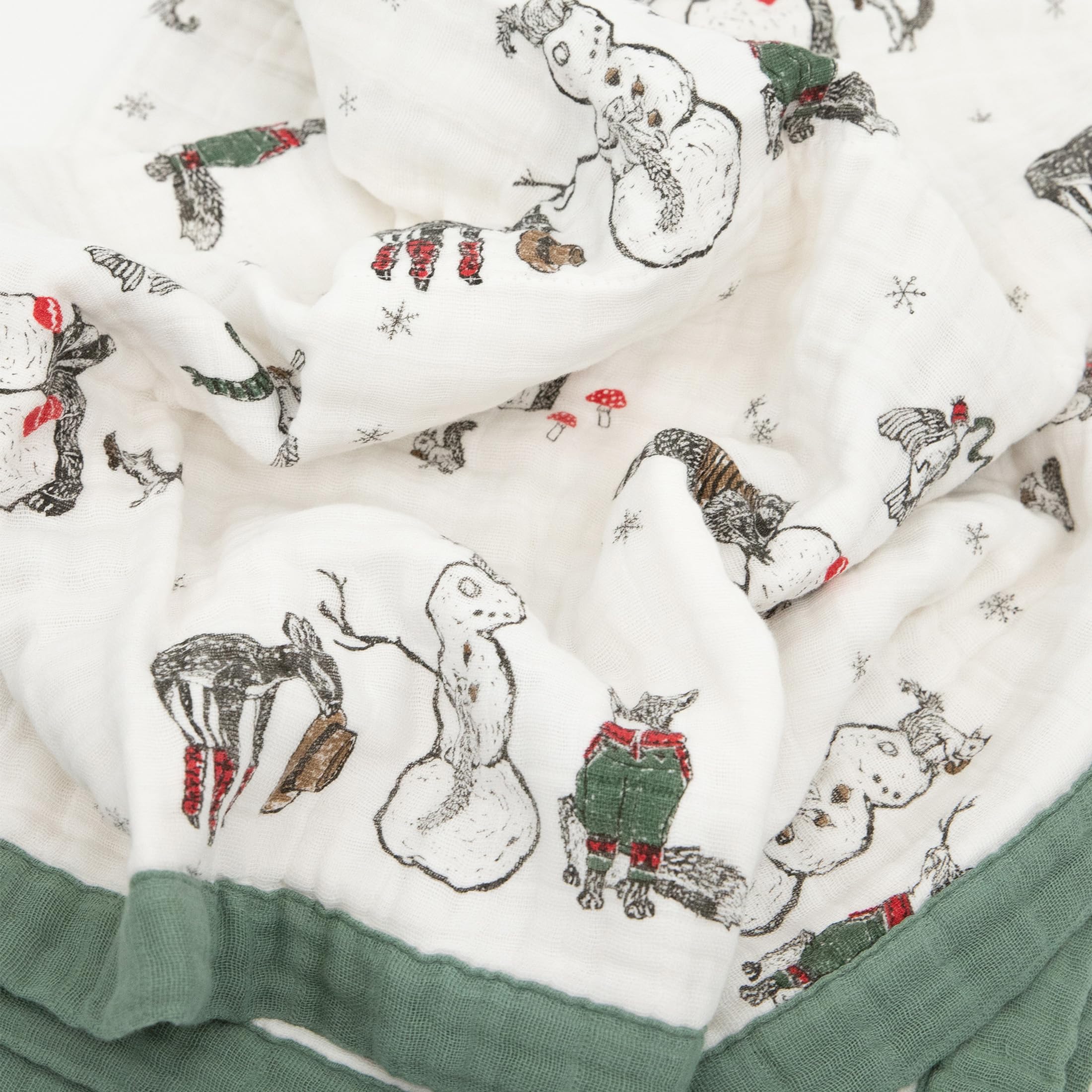 Little Unicorn newborn quilt — on-the-go setup as stroller cover and car seat wrap.