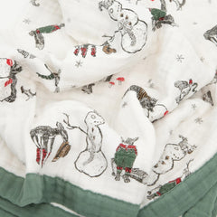 Little Unicorn newborn quilt — on-the-go setup as stroller cover and car seat wrap.