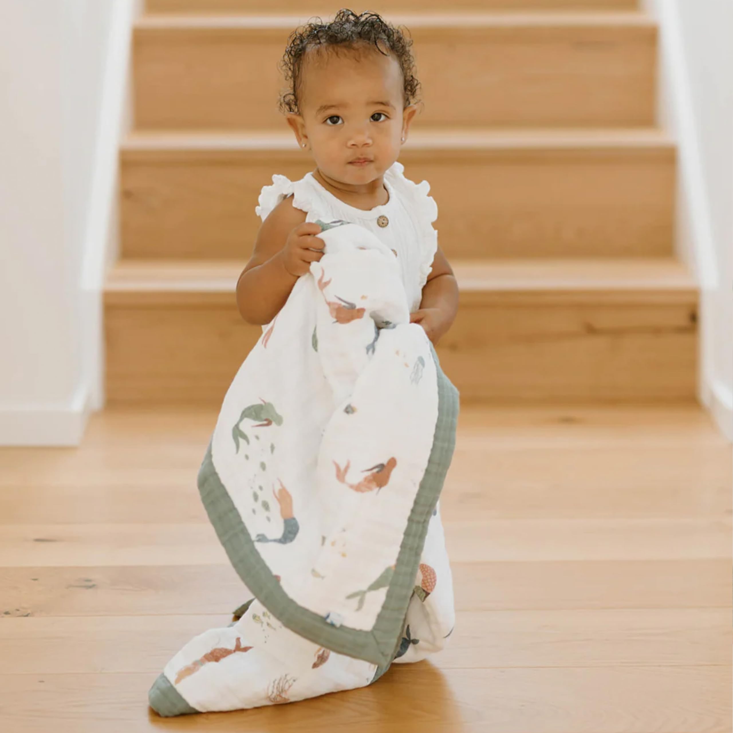 Little Unicorn newborn quilt with bias binding edges for durability