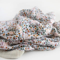 Little Unicorn quilt with bias binding edges for durable comfort.