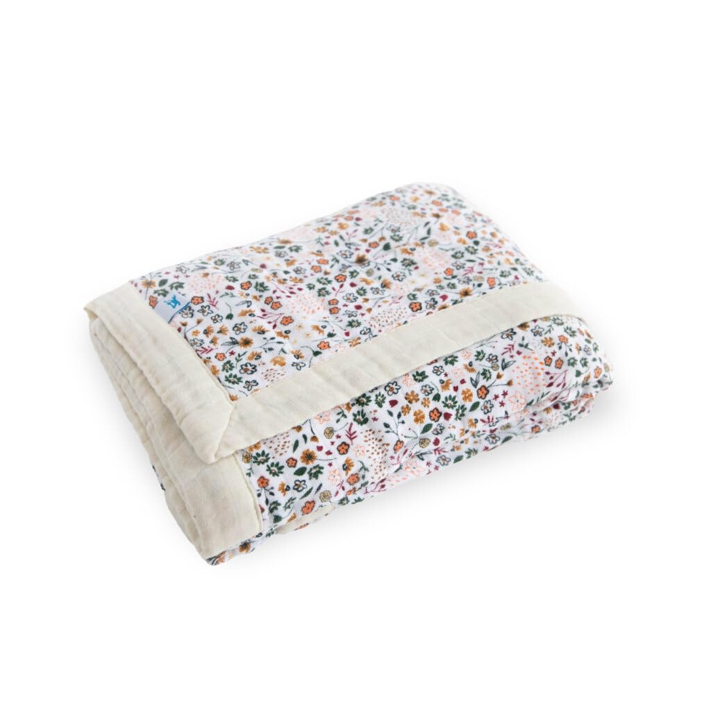 Little Unicorn quilt highlights four-layer muslin for breathable warmth.