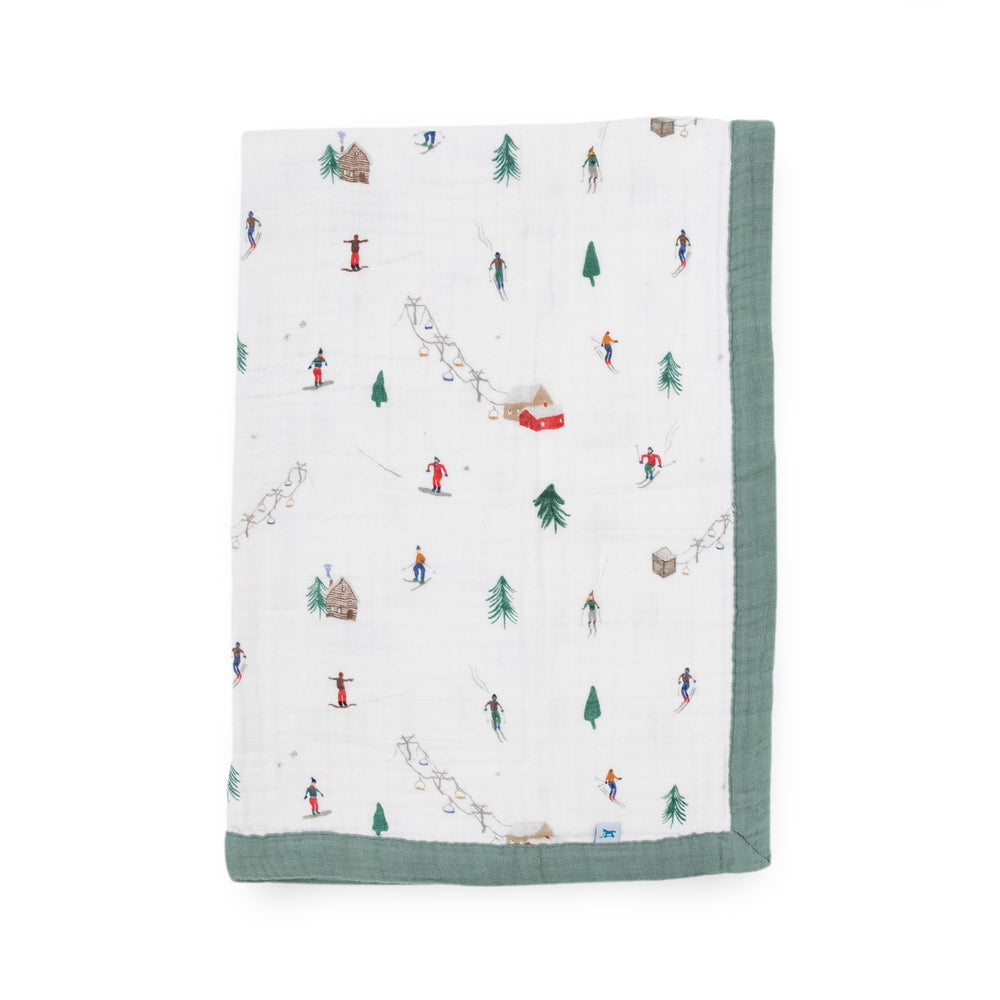 Little Unicorn newborn receiving quilt four-layer muslin in Powder Party for cozy cuddles