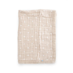 Little Unicorn newborn receiving quilt front view, taupe cross design for cozy snuggles.