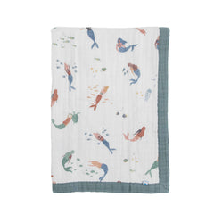 Little Unicorn mermaids quilt folded for a cozy cuddle on the go