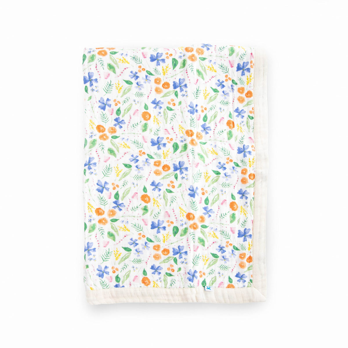 Little Unicorn Mountain Bloom quilt closeup; ultra-soft muslin for cozy newborn cuddles.