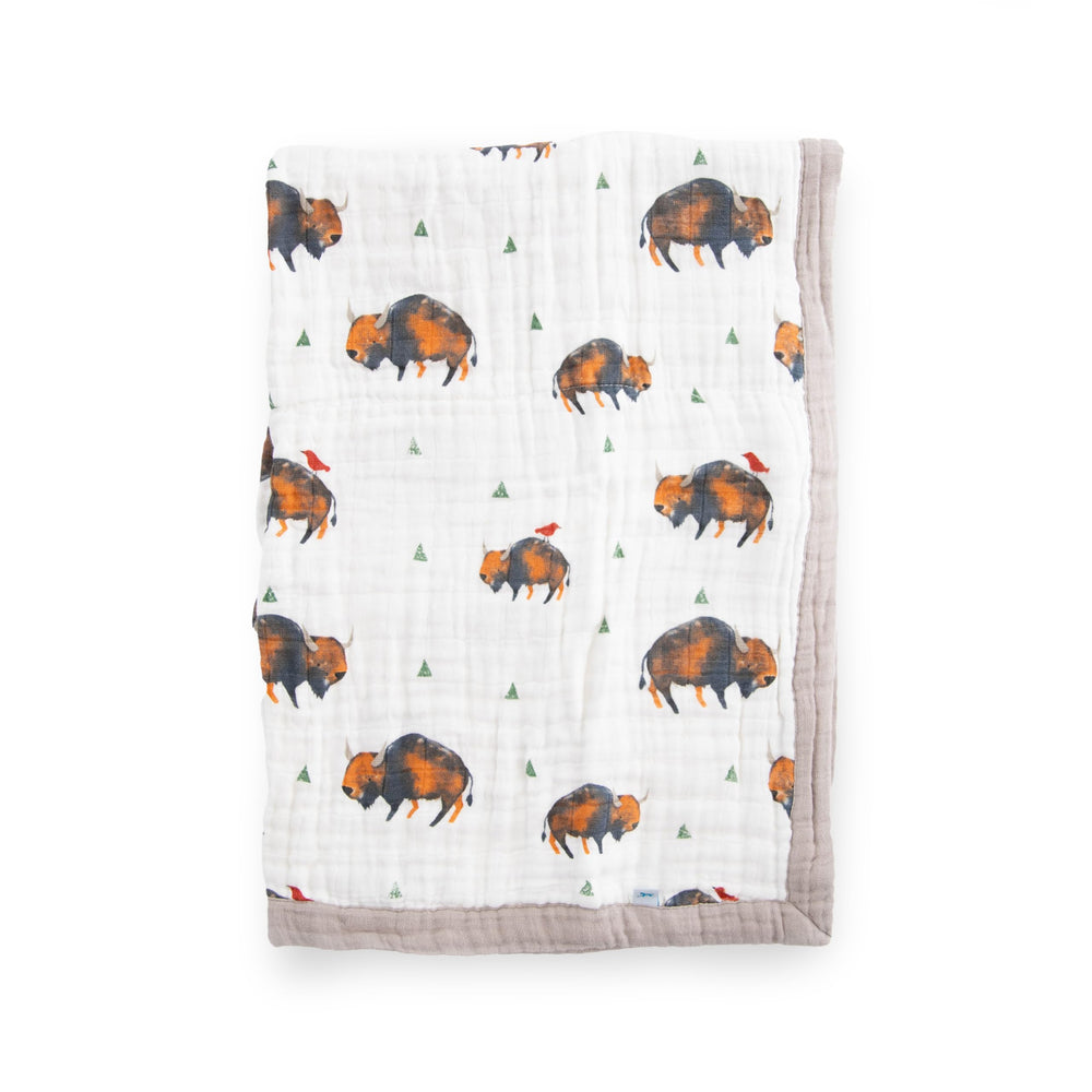 Little Unicorn newborn receiving quilt offers ultra-soft four-layer muslin warmth for cozy naps.