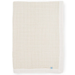 Little Unicorn newborn receiving quilt in soft muslin offers four-layer comfort for cuddles.