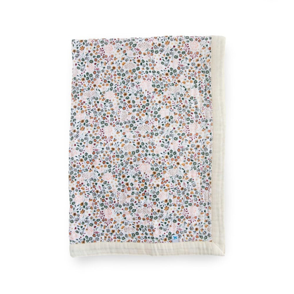 Little Unicorn newborn receiving quilt in soft muslin fabric for gentle everyday cuddles.