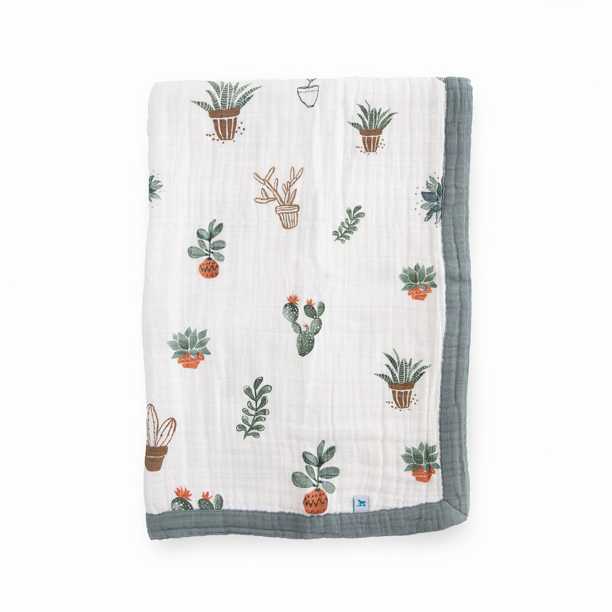 Little Unicorn newborn receiving quilt shows four-layer muslin softness for cozy snuggles.