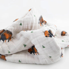 Little Unicorn newborn quilt acts as a stroller cover for on-the-go comfort.