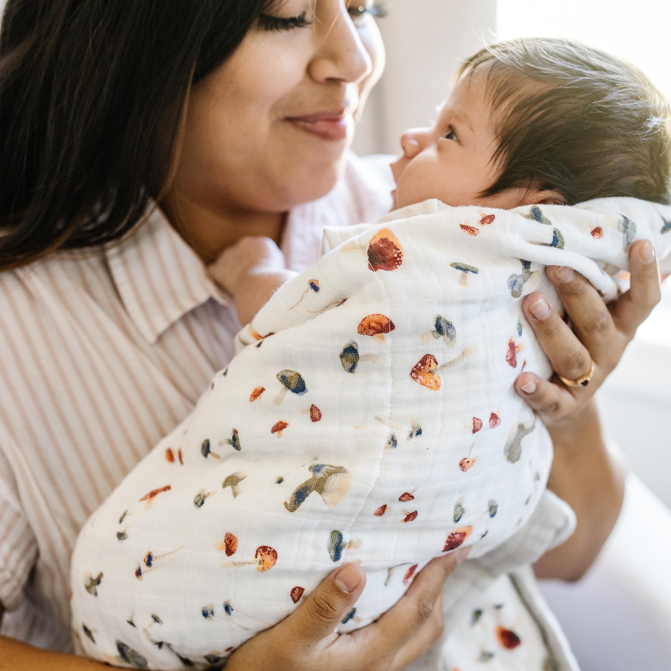 Little Unicorn newborn quilt travel-ready, lightweight and compact for outings