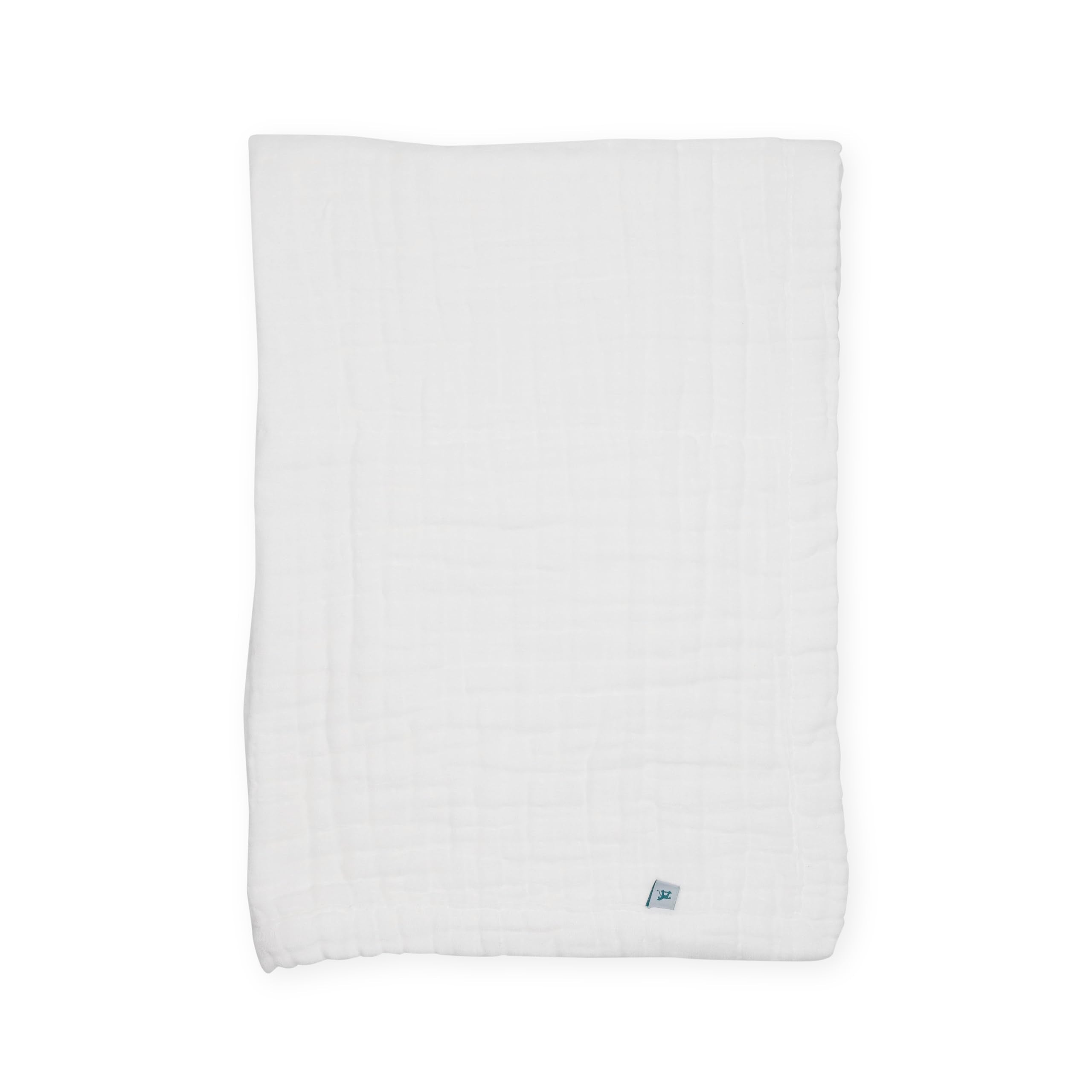 Little Unicorn organic newborn quilt folded for easy storage.