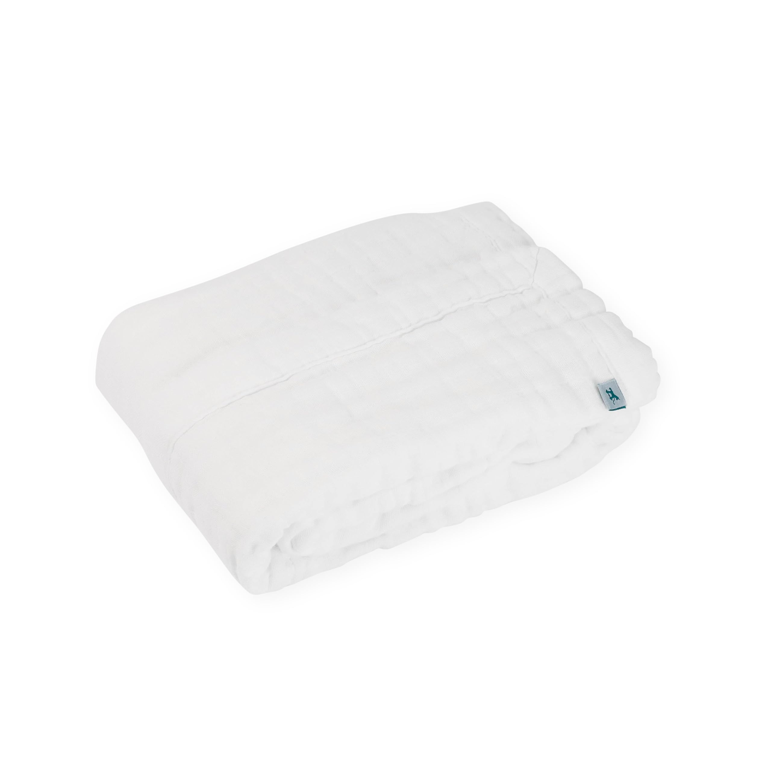 Little Unicorn organic newborn quilt in stroller for on-the-go comfort.