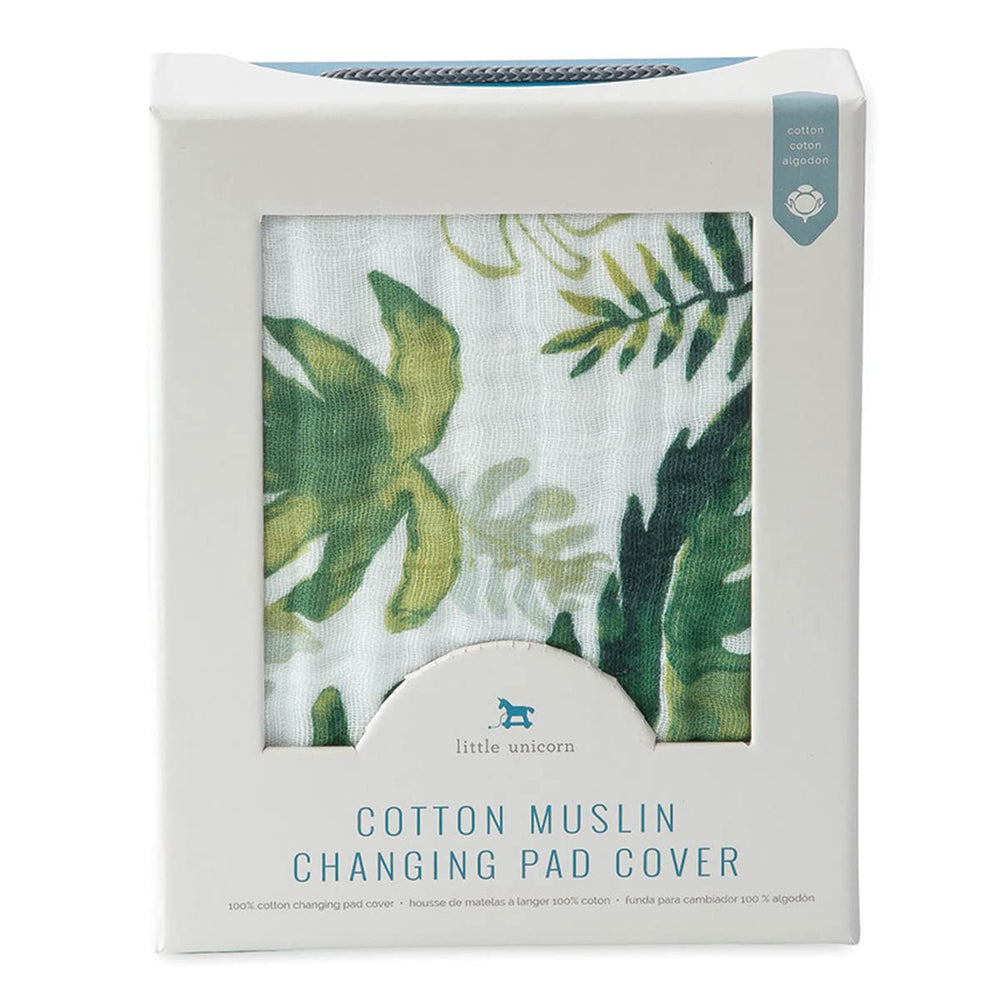 Little Unicorn premium changing pad cover tropical leaf on pad demonstrates snug elastic fit