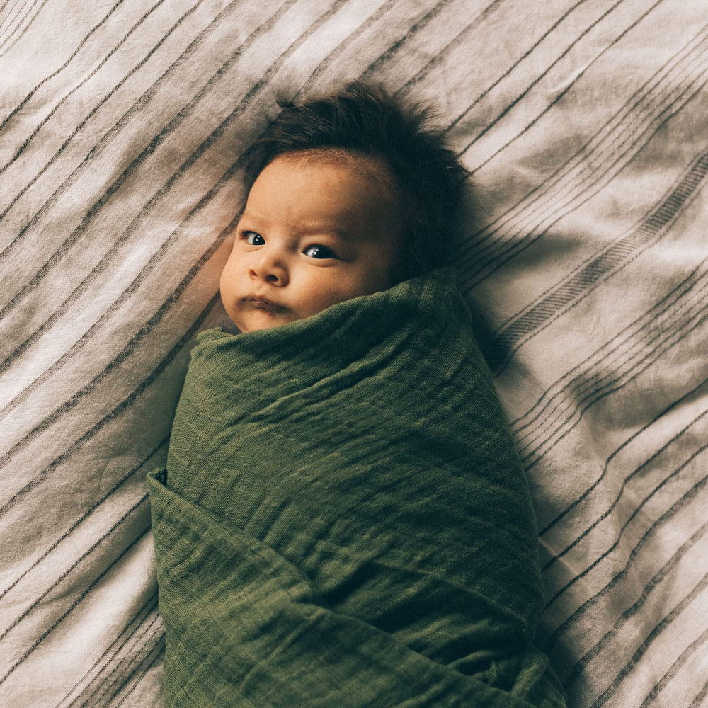 Little Unicorn Fern swaddle gift-ready, charming design for baby showers.