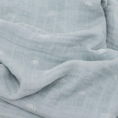 Little Unicorn swaddle wrapped baby showcasing soft fabric and secure fit