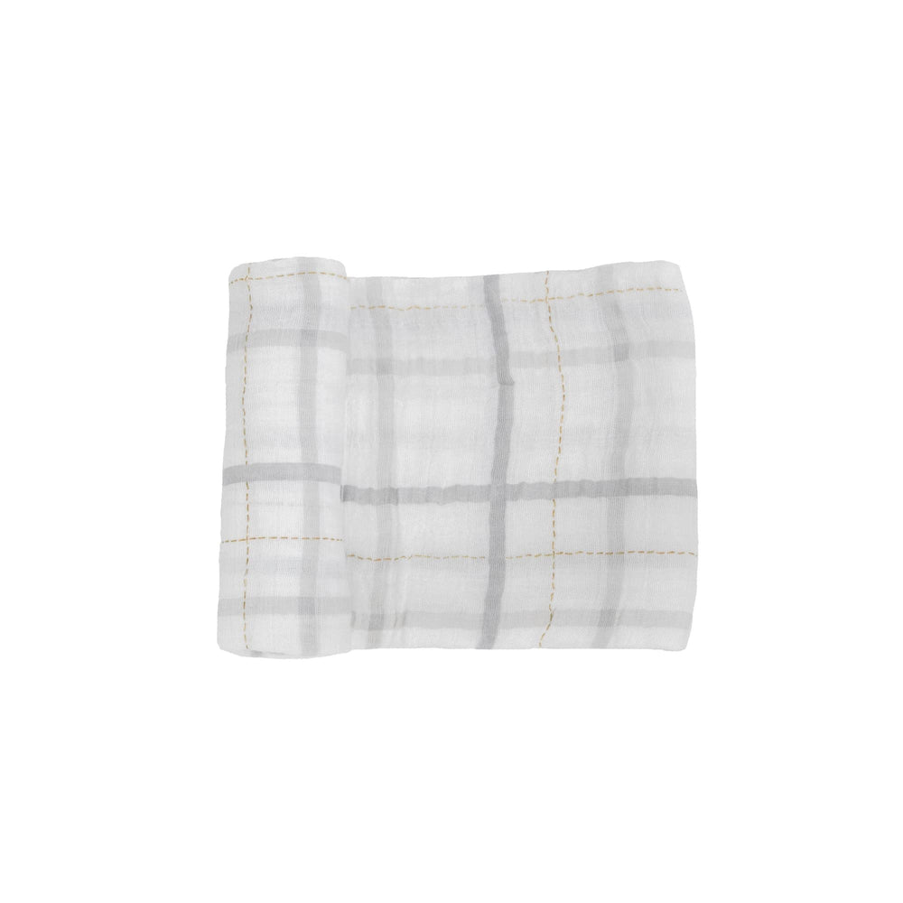 Little Unicorn Premium Cotton Swaddle Grey Plaid laid flat to show cotton muslin texture and pattern