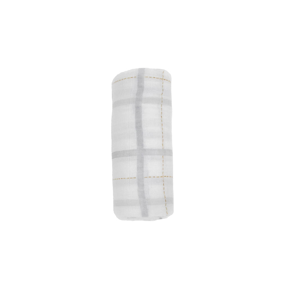 Little Unicorn gift-ready packaging shown with grey plaid swaddle