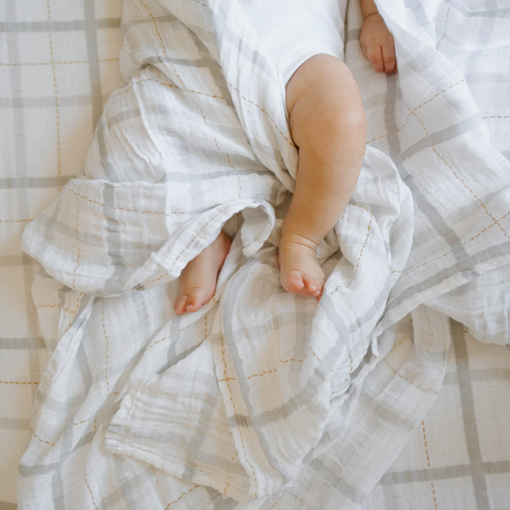 Little Unicorn premium swaddle close-up highlighting breathable cotton fibers