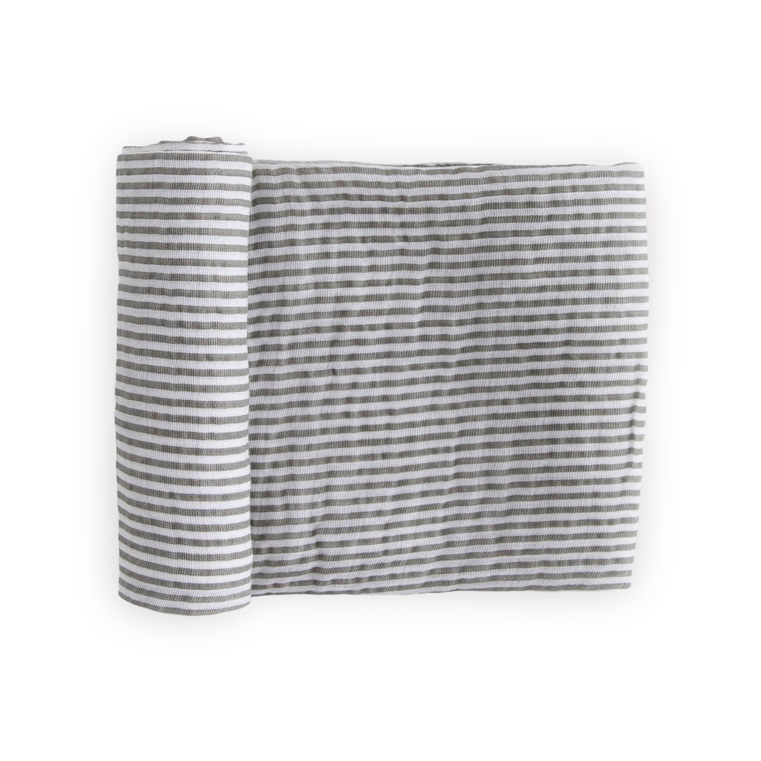 Little Unicorn premium cotton swaddle in grey stripe folded for travel and storage