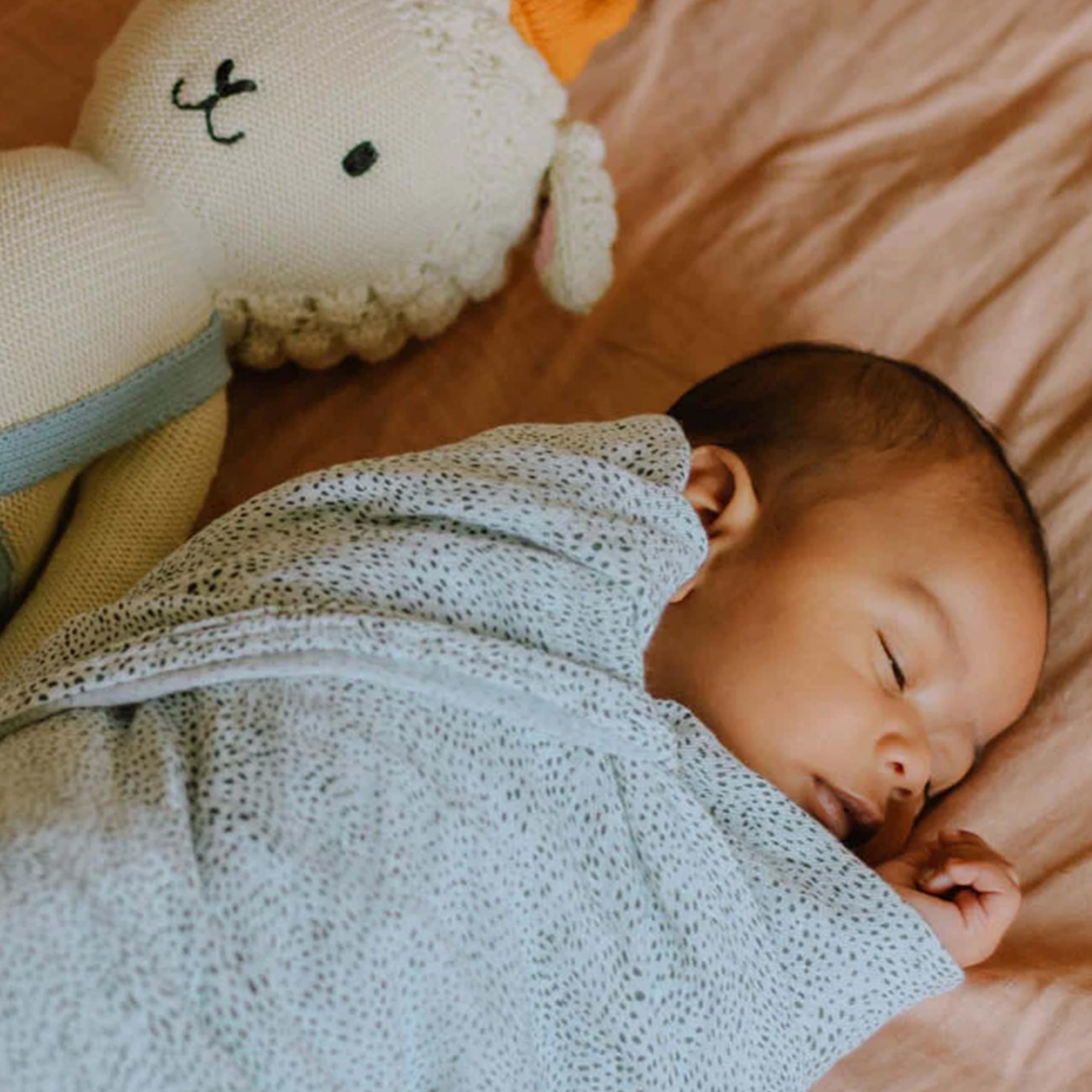 Little Unicorn swaddle packaging displays breathable cotton quality.