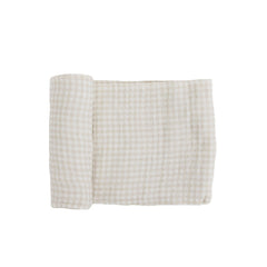 Little Unicorn premium cotton swaddle in tan gingham, breathable fabric for cozy swaddling.