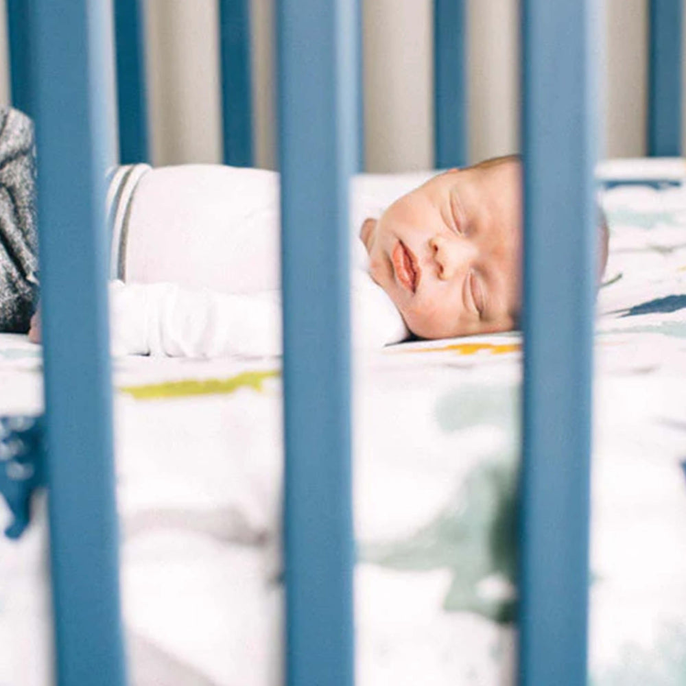 Little Unicorn crib sheet fits standard 52x28 crib mattresses securely with elastic edges.
