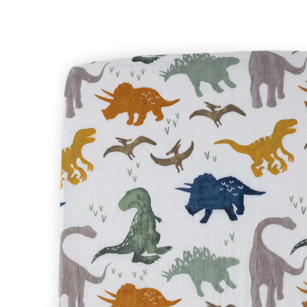 Little Unicorn Premium crib sheet with Dino Friends print for a playful nursery and soft touch.