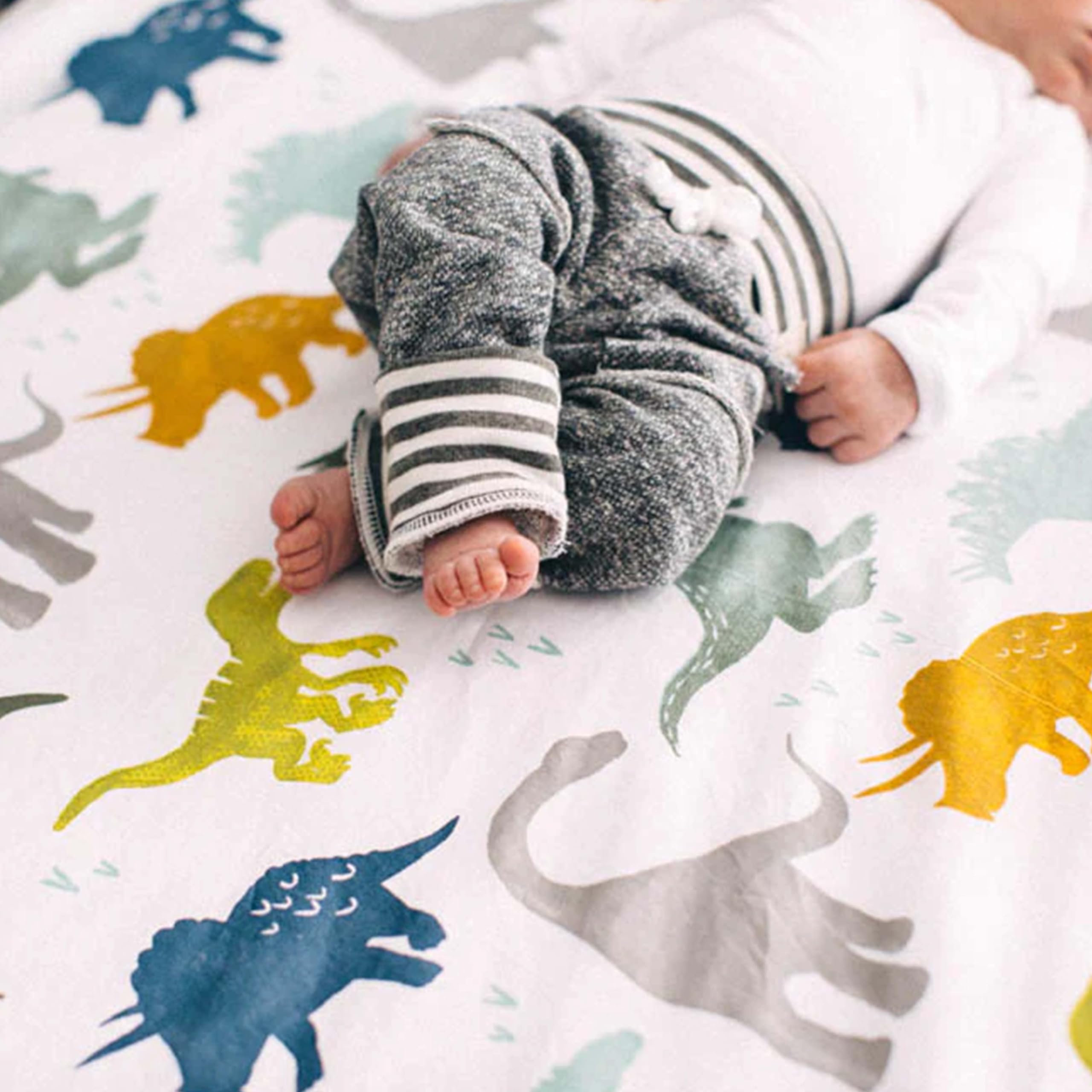 Elastic-secure edges keep the Little Unicorn sheet in place for safe sleep.