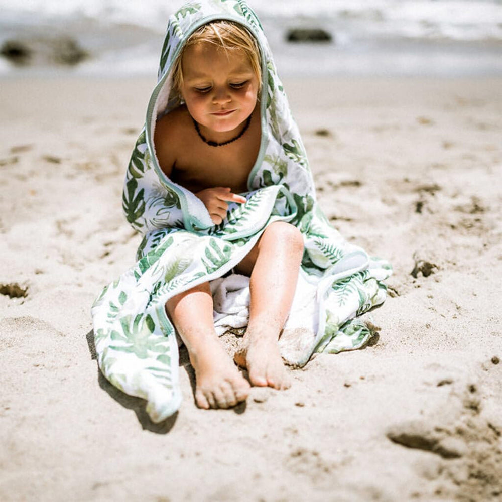 Soft French terry blend keeps little one warm after bath with Little Unicorn towel