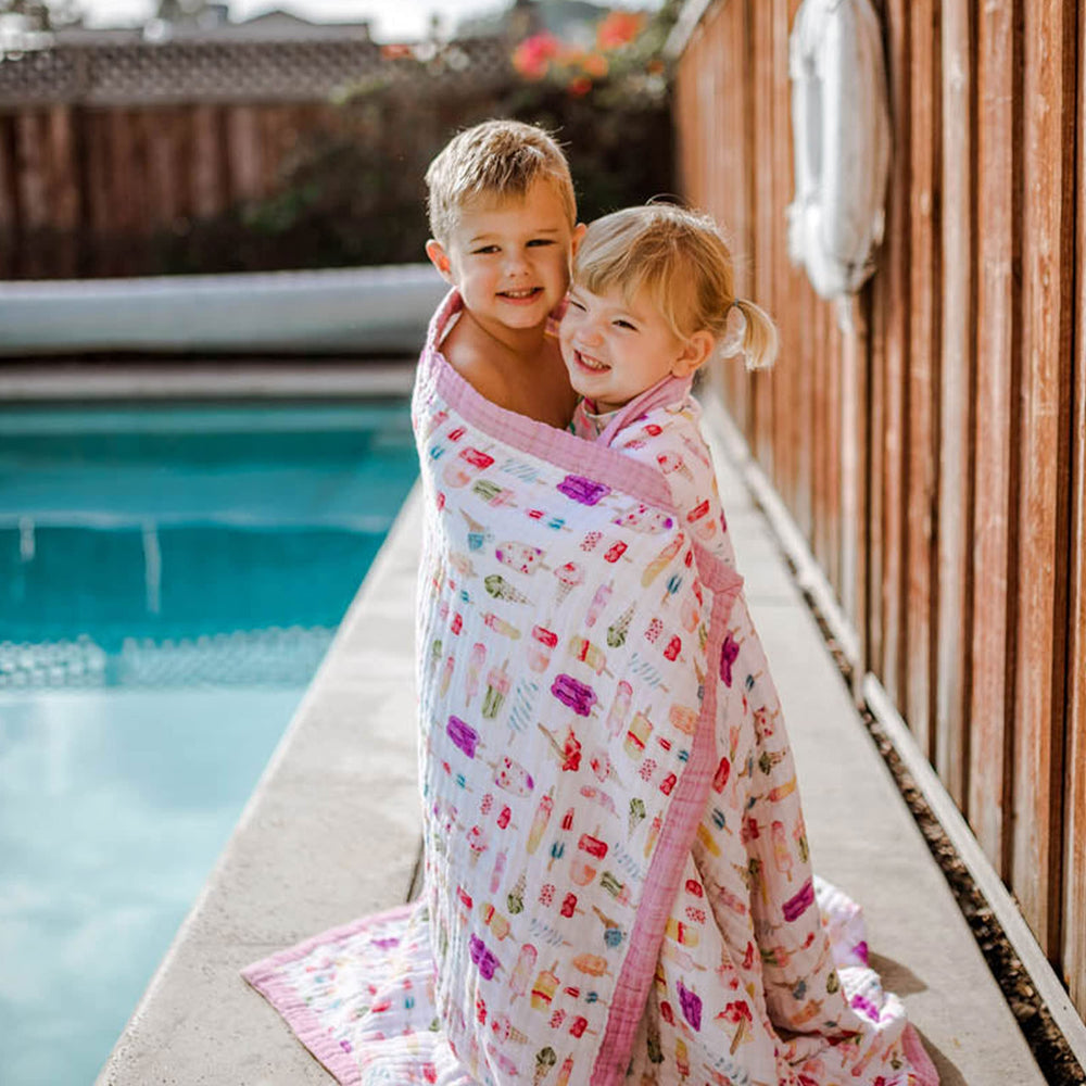 Little Unicorn Premium Quilted Throw color-coordinated reverse side enhances nursery decor