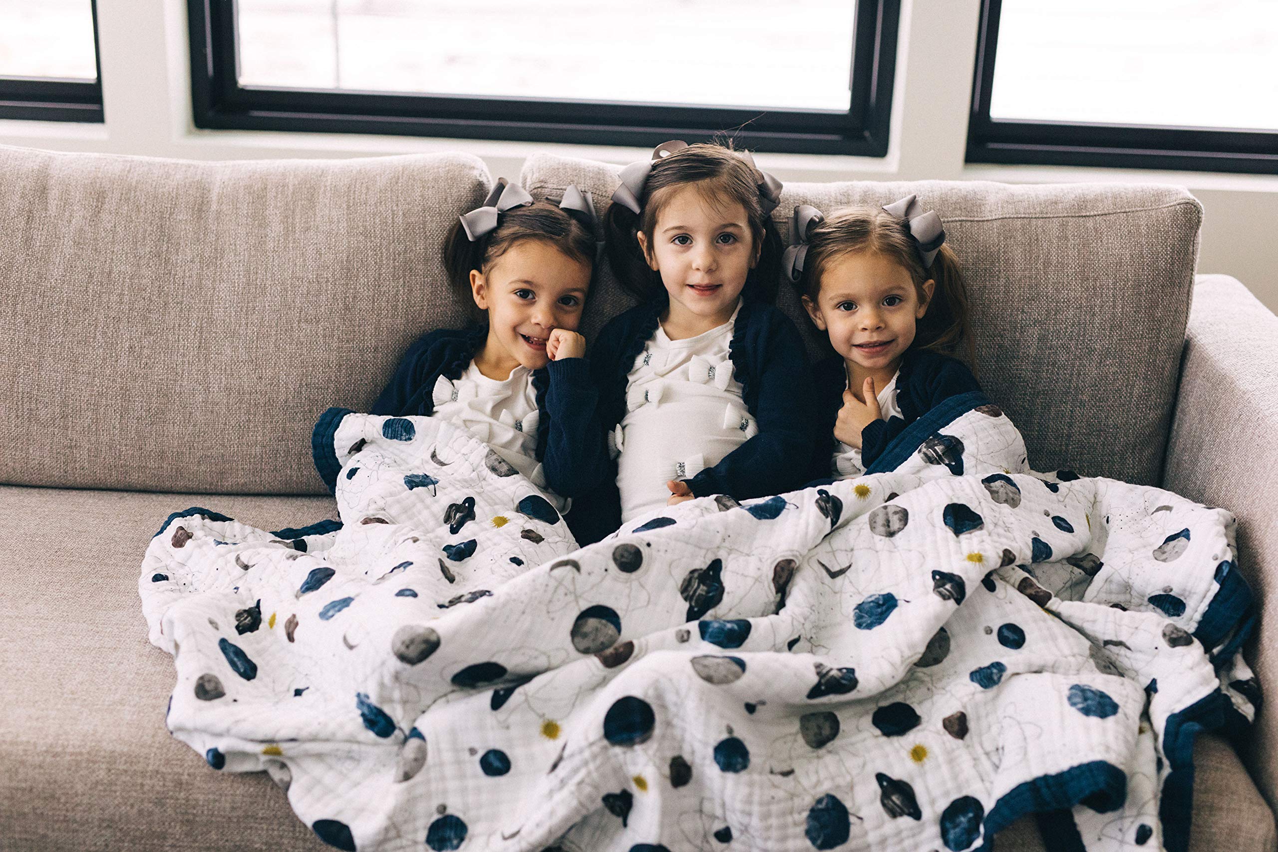 Little Unicorn Premium Quilted Throw machine washable and colorfast for easy care.
