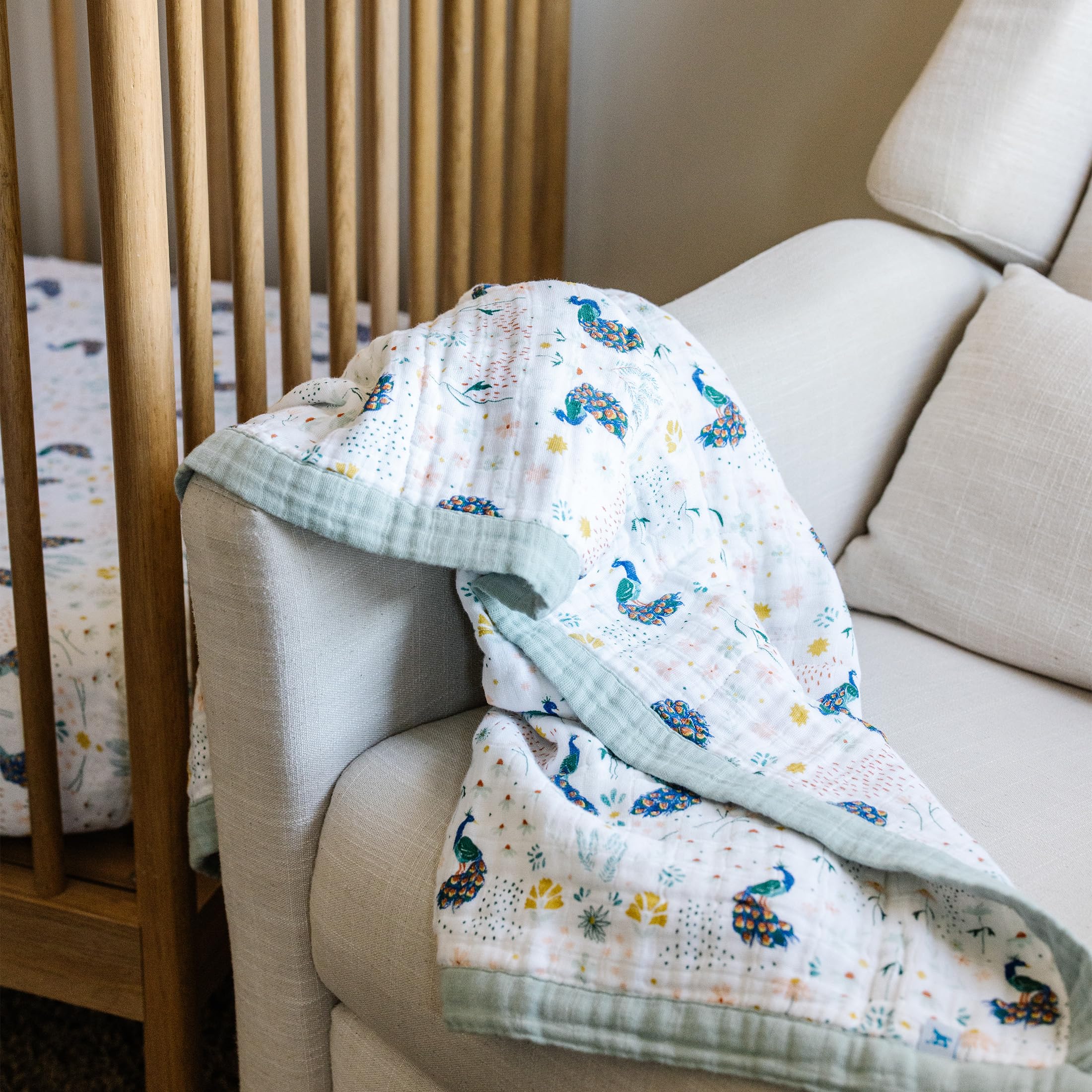 Little Unicorn soft-foldable quilt folds compactly for easy packing.