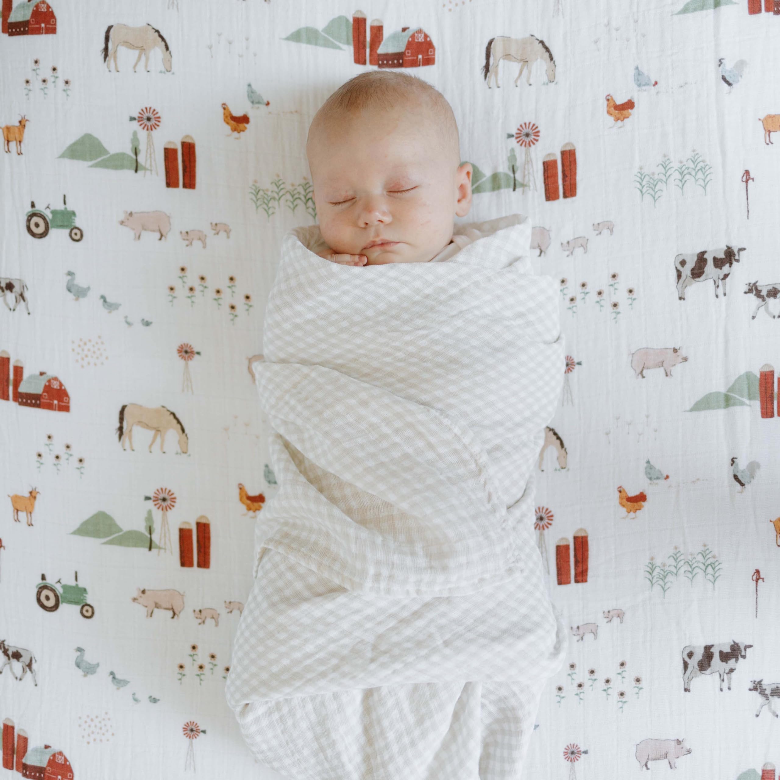 Little Unicorn soft cotton muslin nursing cover option.